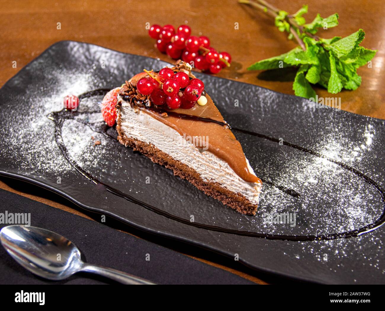 Chocolate cake with beautiful garnish Stock Photo Alamy