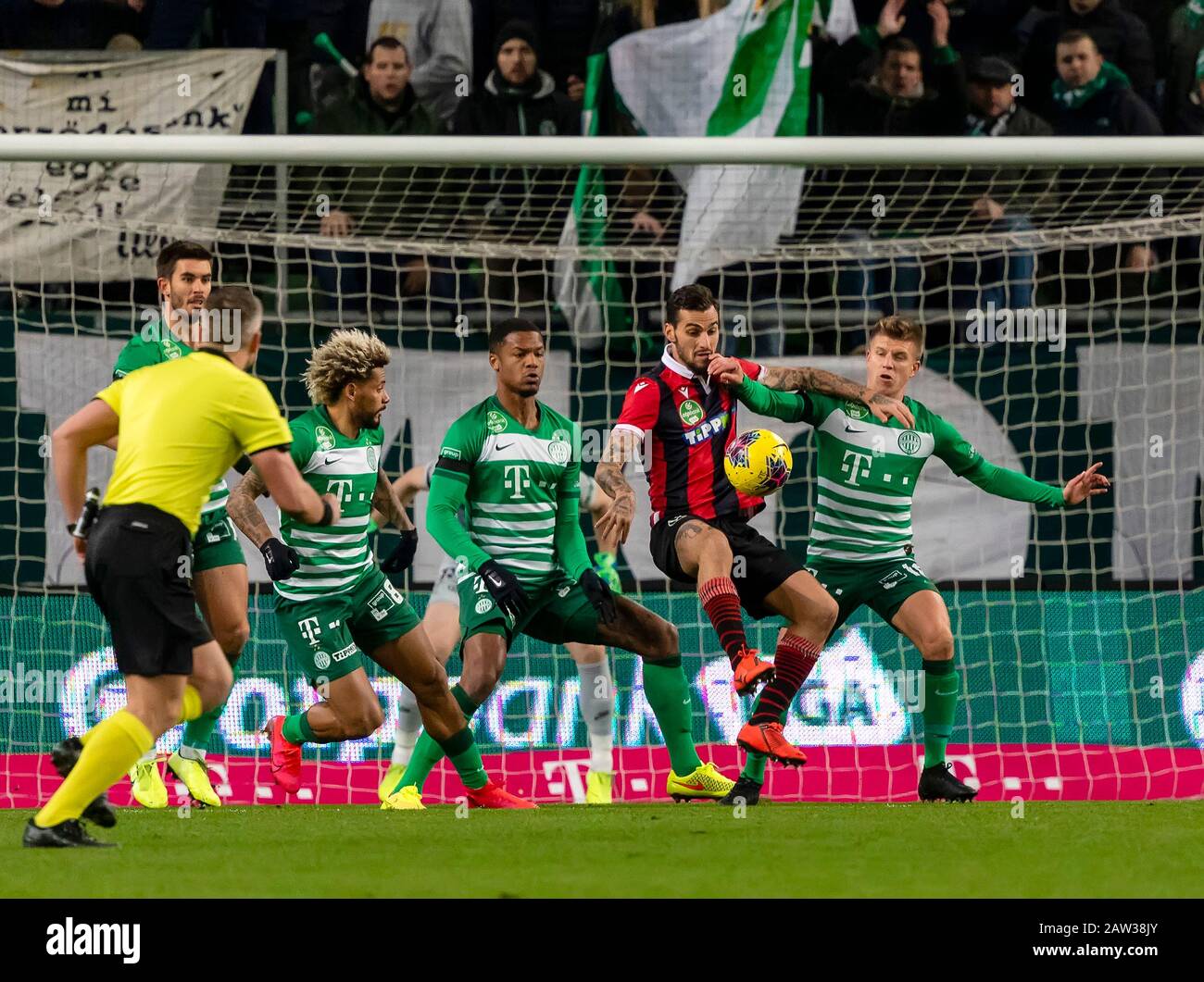 BUDAPEST, HUNGARY - JUNE 20: (r-l) Isael da Silva Barbosa of Ferencvarosi TC  challenges Dzenan Burekovic of Ujpest FC during the Hungarian OTP Bank Liga  match between Ferencvarosi TC and Ujpest FC