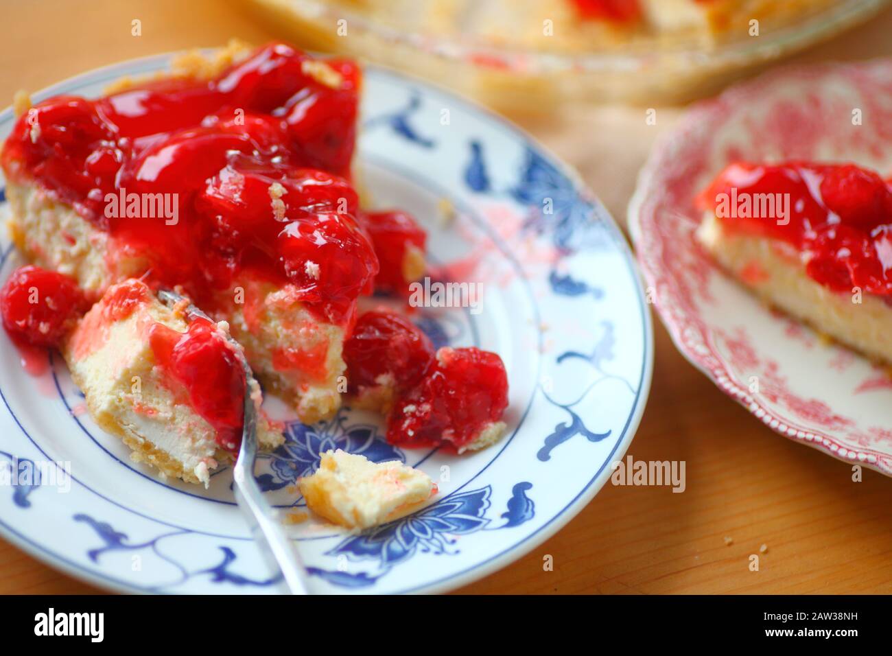 Cream cheese pie with glazed cherry topping Stock Photo