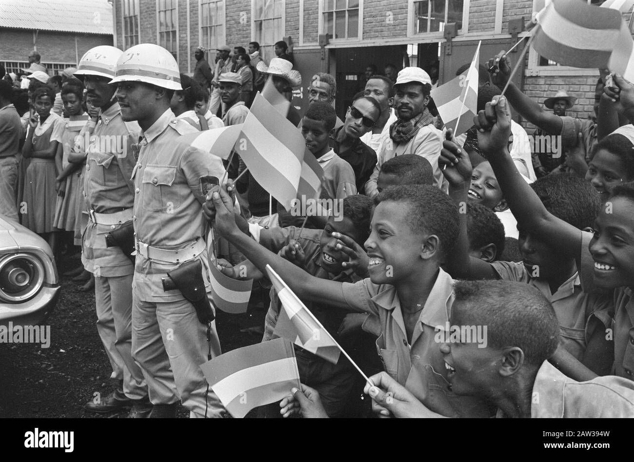 Royal family in Ethiopia # 21., 22: Ethiopian soldiers, No. 23A:. Jubilant Ethiopian children waving flags Date: January 28, 1969 Location: Ethiopia Keywords: children, SOLDIERS, families, flags Stock Photo