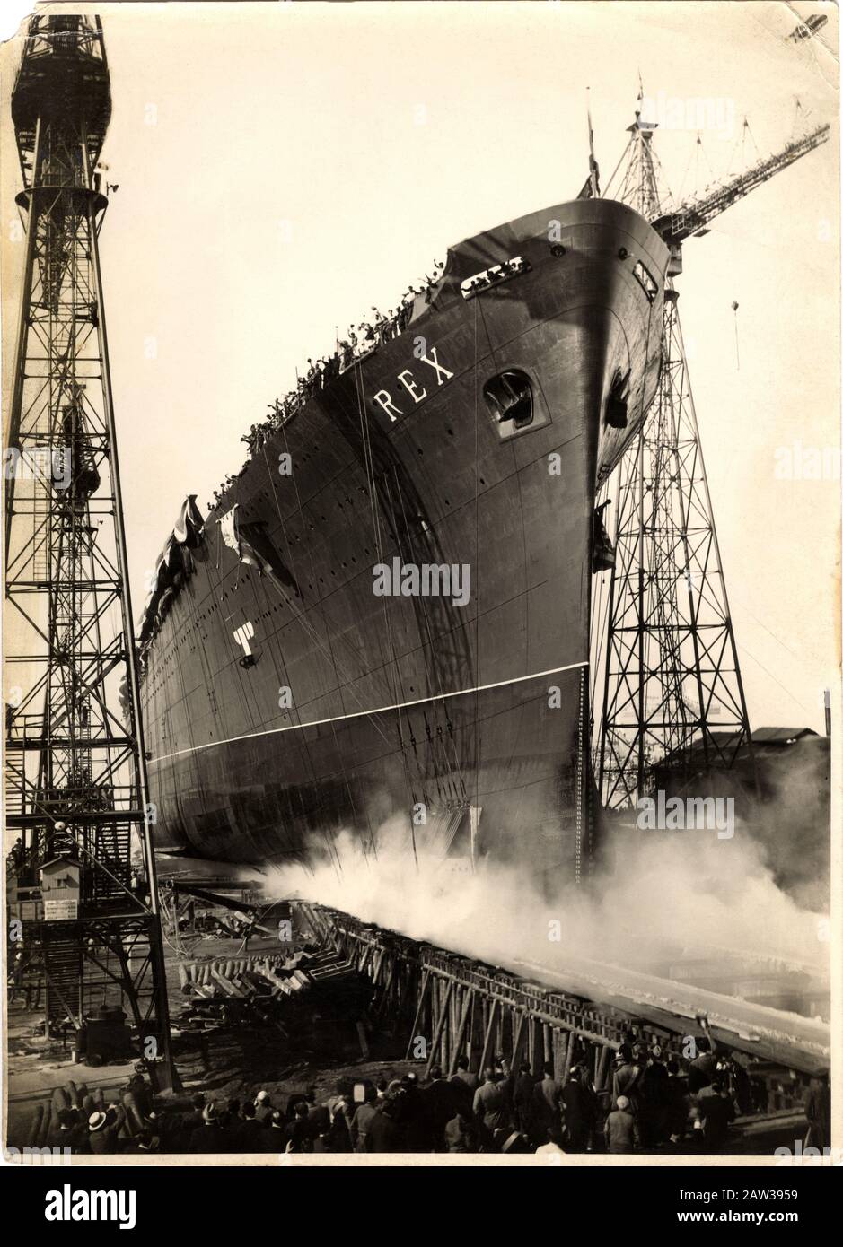 1930's, GENOVA , ITALY  : The S.S. Rex was an Italian 51,100 ton ocean liner during the  launch the day 1 august  1931 . Photo by Giovanni Agosto , Ge Stock Photo