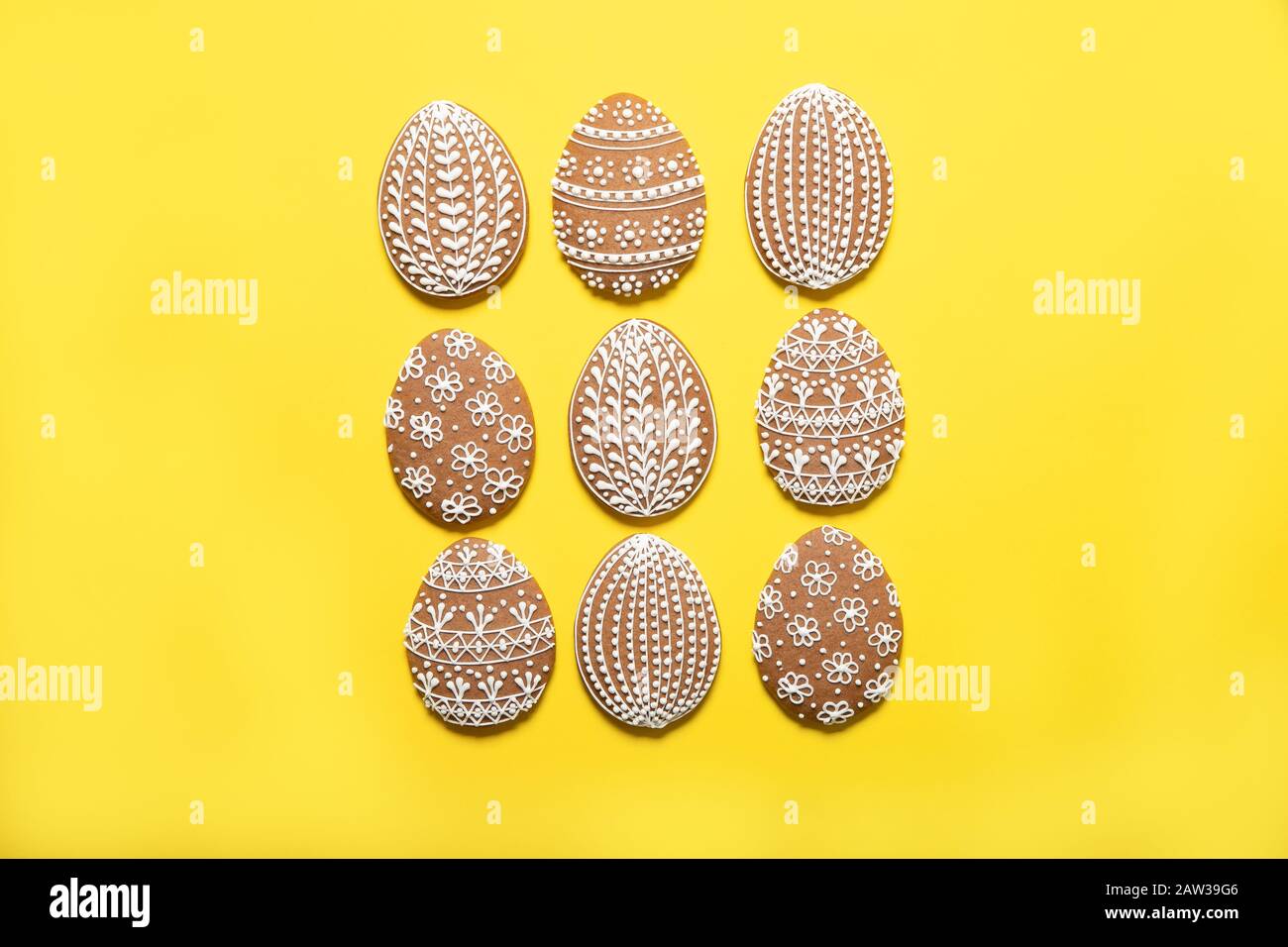 Easter cookies on a yellow background. Place for text. Easter eggs. Stock Photo
