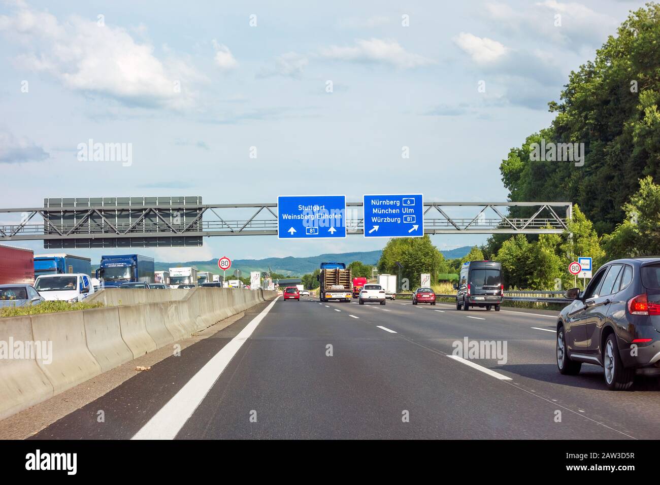 Weinsberg, Germany - June 28, 2017: Highway A6 / A81(Autobahn) near town Weinsberg, interchange 'Kreuz Weinsberg' - direction Stuttgart / Weinsberg - Stock Photo