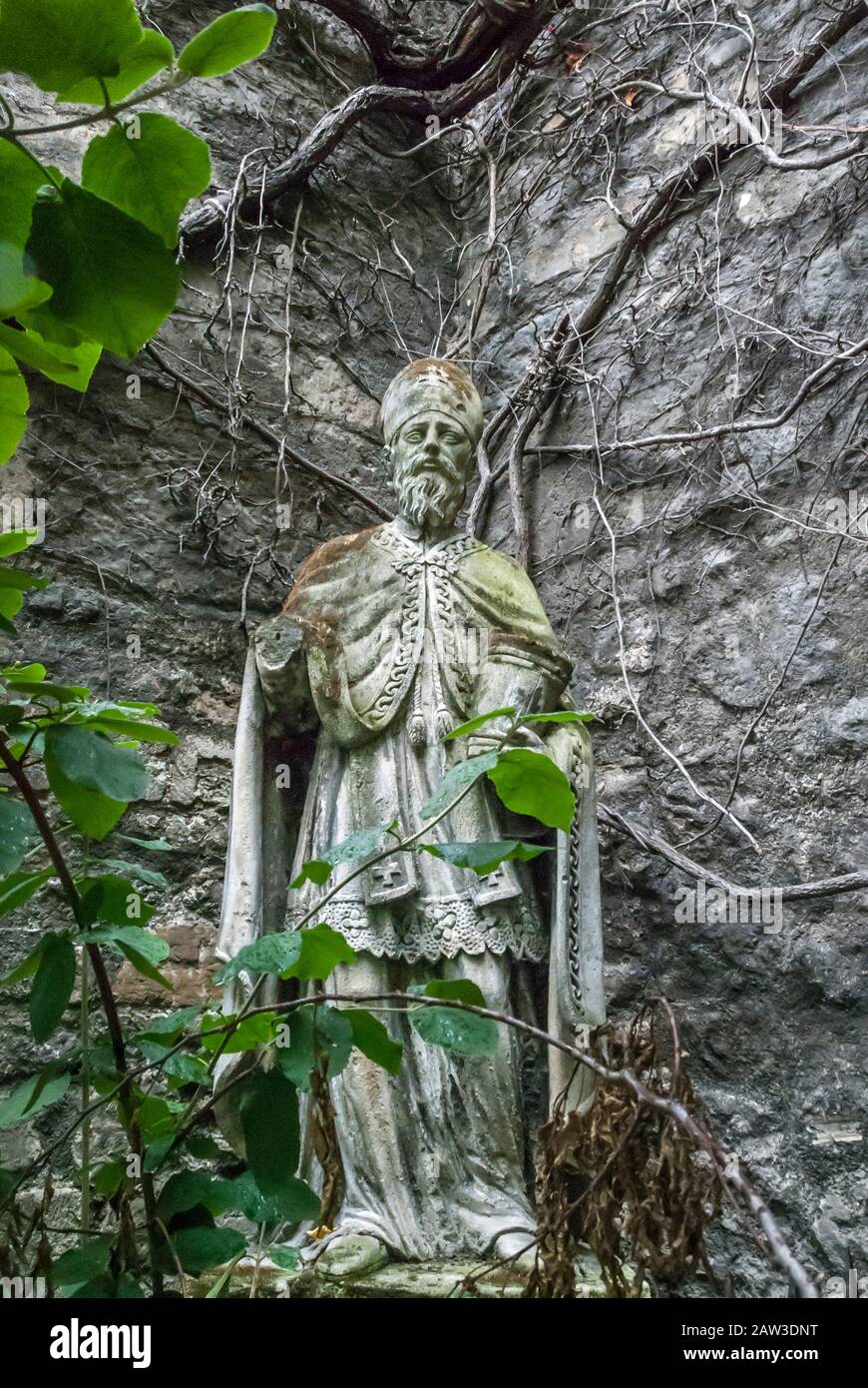 Vienna, Austria - August 05, 2019. Statue of Saint Rupert outside St. Ruprecht's Church - oldest in the Vienna. Medieval saint sculpture built in 8th Stock Photo