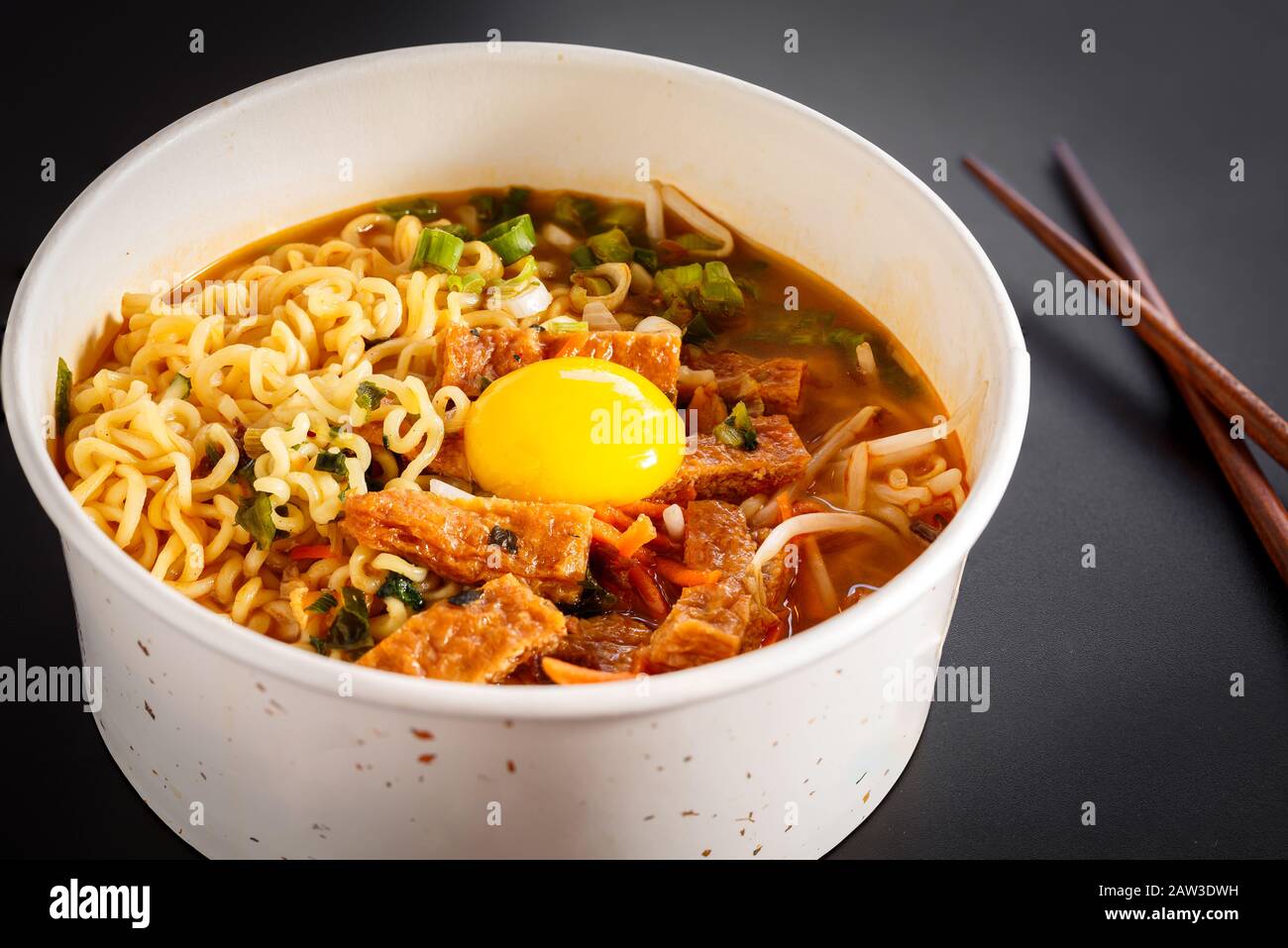Classic Korean Ramen Noodle Bowl with Raw Egg Yolk Stock Photo - Alamy