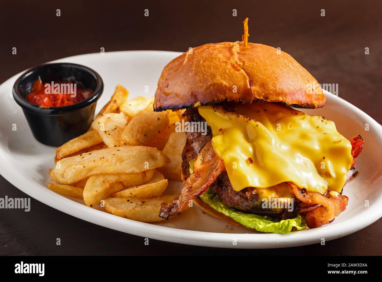 American style Bacon Cheeseburger with French Fries Stock Photo Alamy
