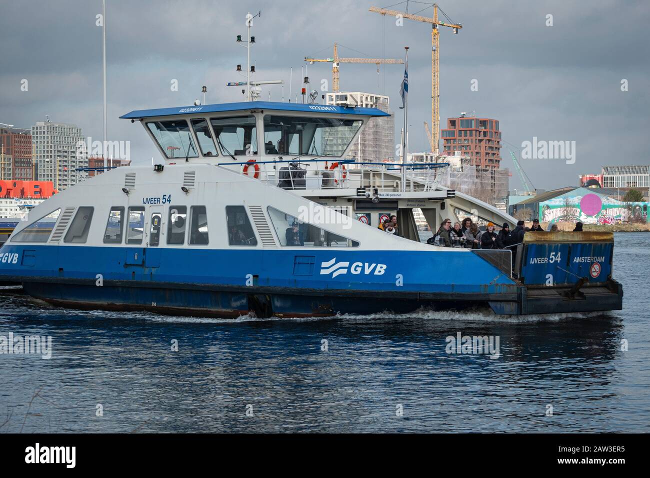 Ferry carrying passengers between Amsterdam and Amsterdam Noord (North). Stock Photo