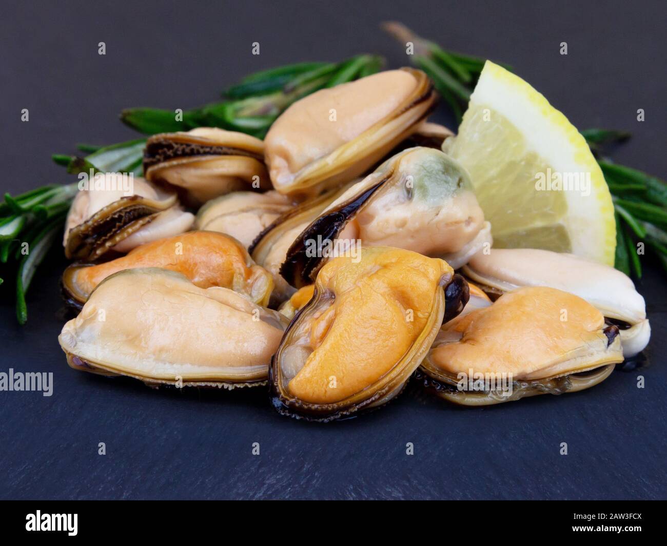Mussels in oil and spices food background copy space. Stock Photo