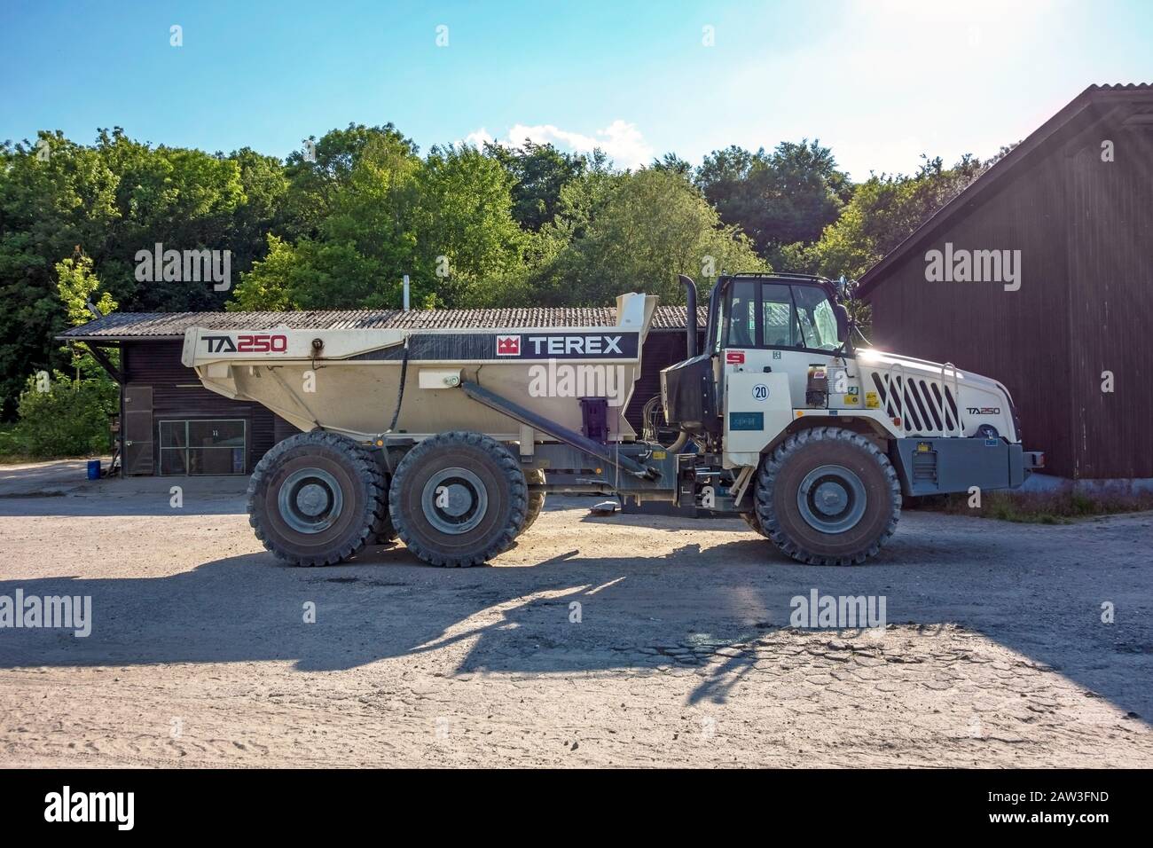 Hagenbach, Germany - May 31, 2014: Large Volvo Terex Truck TA 250 in open pit mining and processing plant for crushed stone, sand and gravel at polder Stock Photo