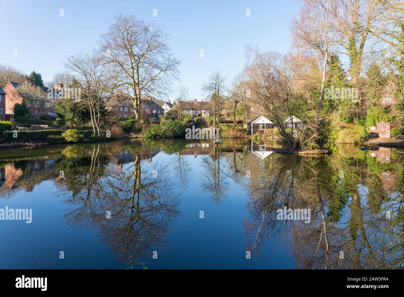The pool at the centre of the Moor Pool Estate which is a garden suburb in Harborne, Birmingham and is a conservation area. Stock Photo