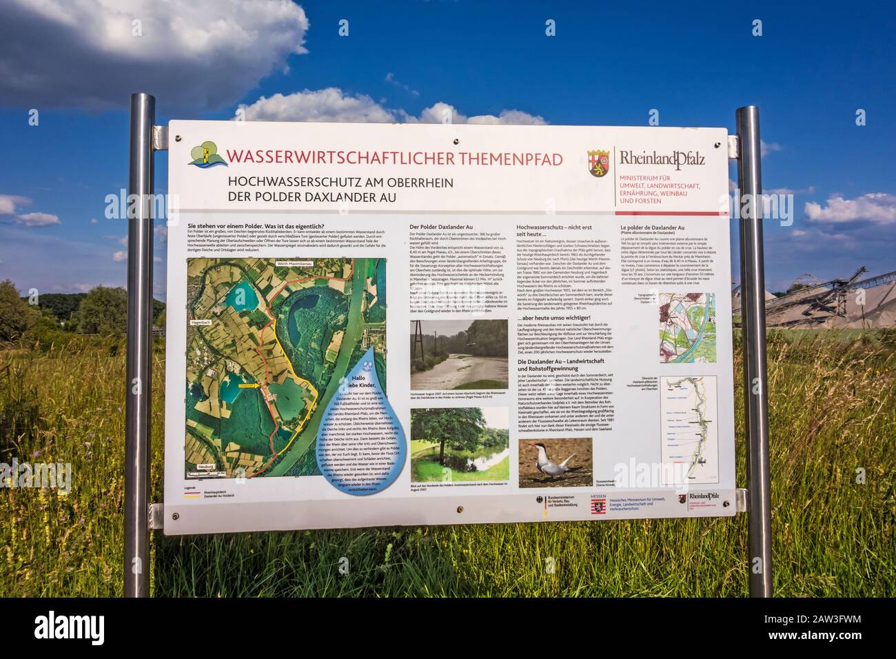 Hagenbach, Germany - May 31, 2014: Flood defence information sign of environment department of Rhineland-Palatinate - polder Daxlander Au protects the Stock Photo
