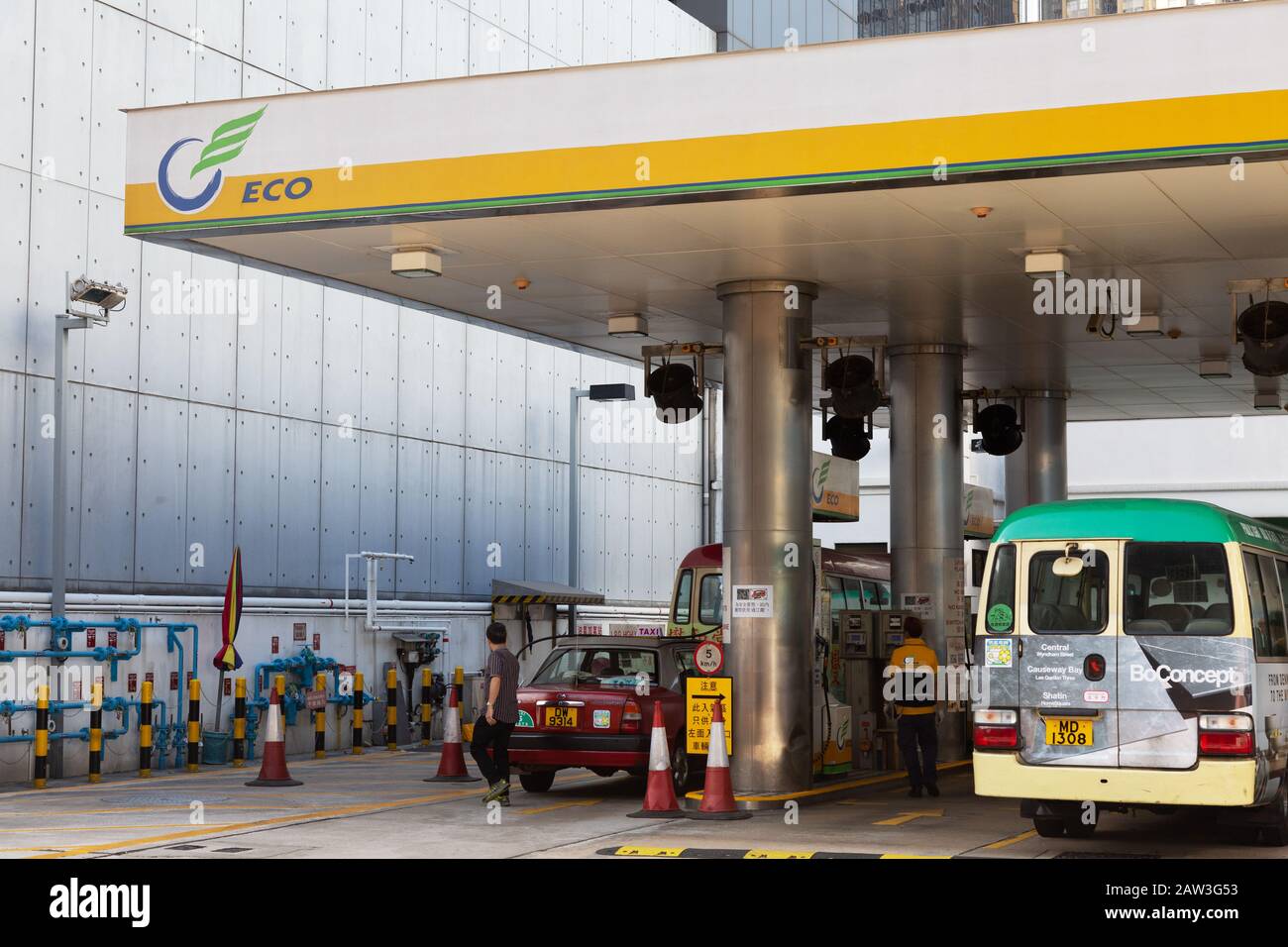 Eco LPG gas filling station, environmentally friendly vehicle fuel,with vehicles refuelling; Hong Kong Asia Stock Photo