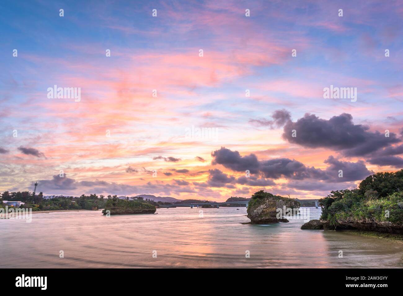 View of Kouri Island, Okinawa, Japan from Yagaji Island at dusk. Stock Photo