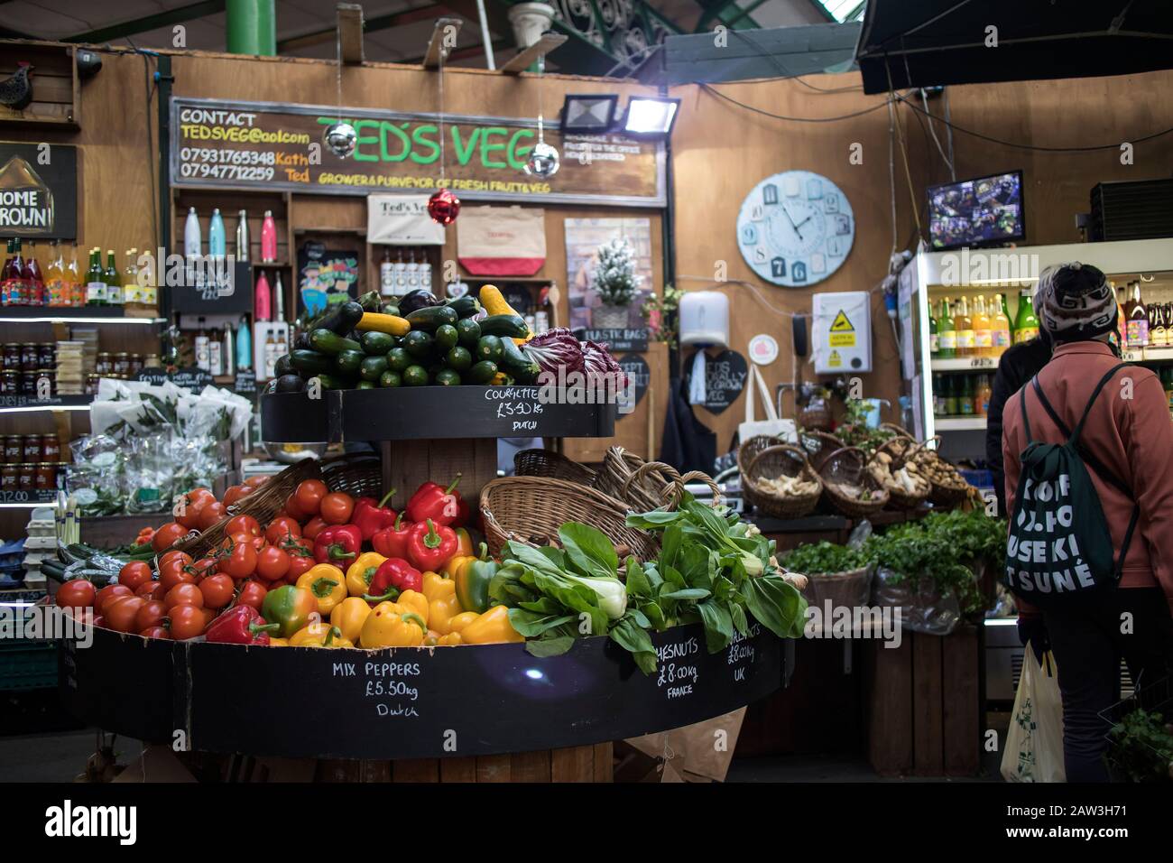 London, UK, - 23 - December 2020, Different types of vegetables and salads on the counter at Borough Market. Interior of a vegetable shop Stock Photo