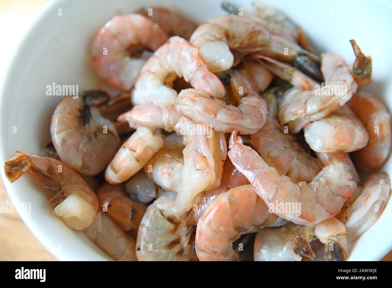 Peeled and unpeeled shrimp from overhead Stock Photo Alamy