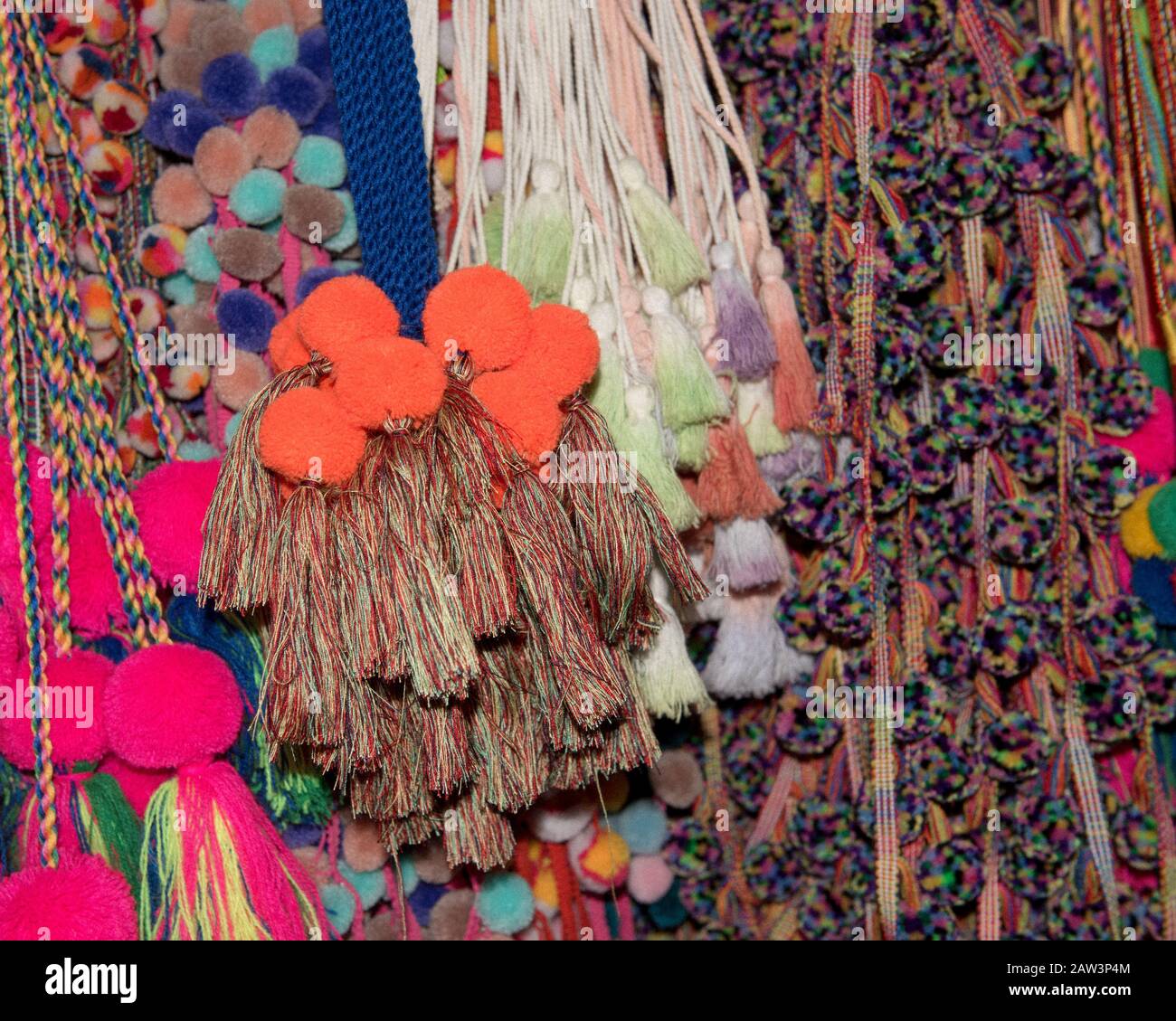 Colorful pom poms for sale at a market Stock Photo Alamy