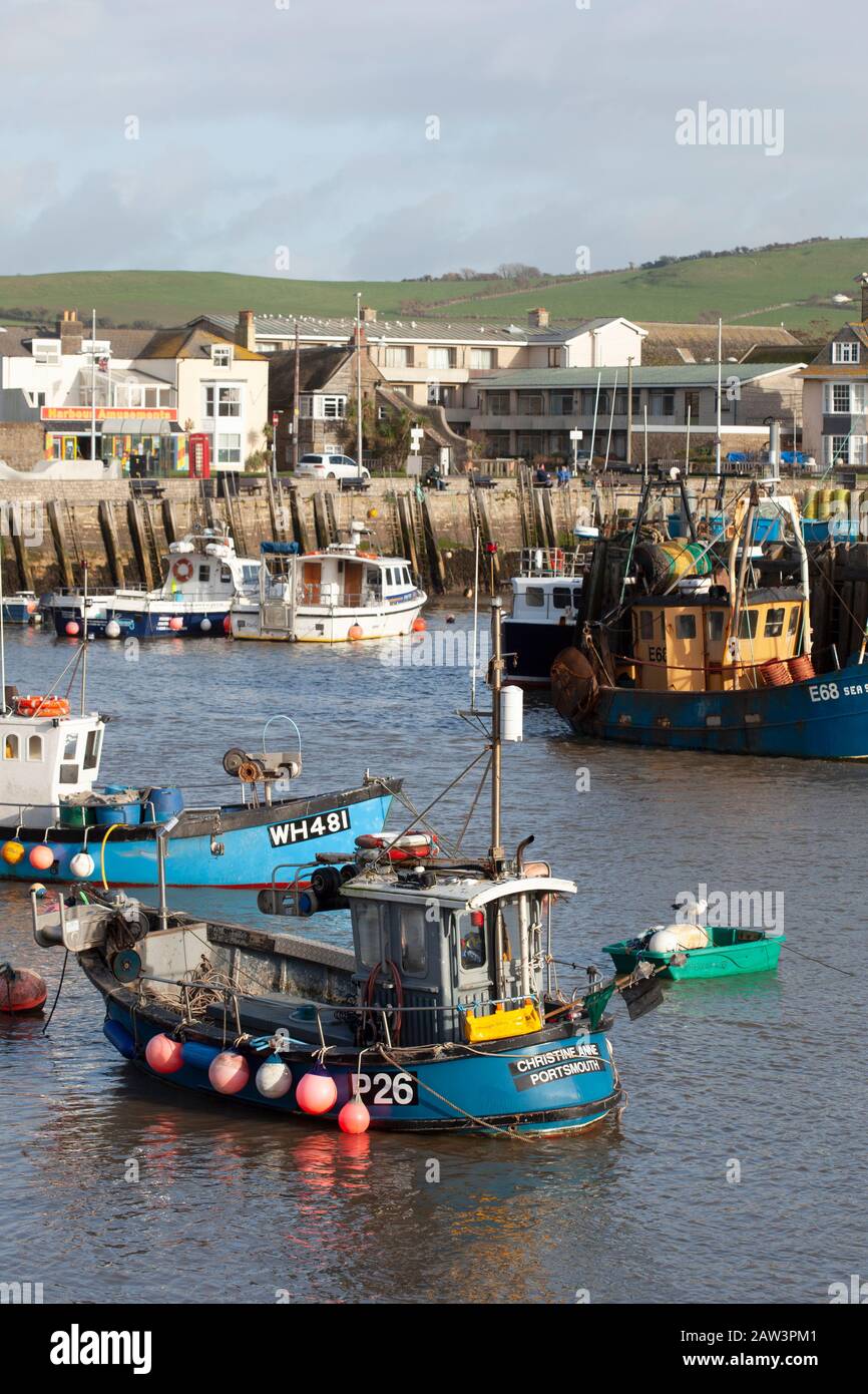 Fishing boats in the harbour at West Bay, Dorset Stock Photo - Alamy