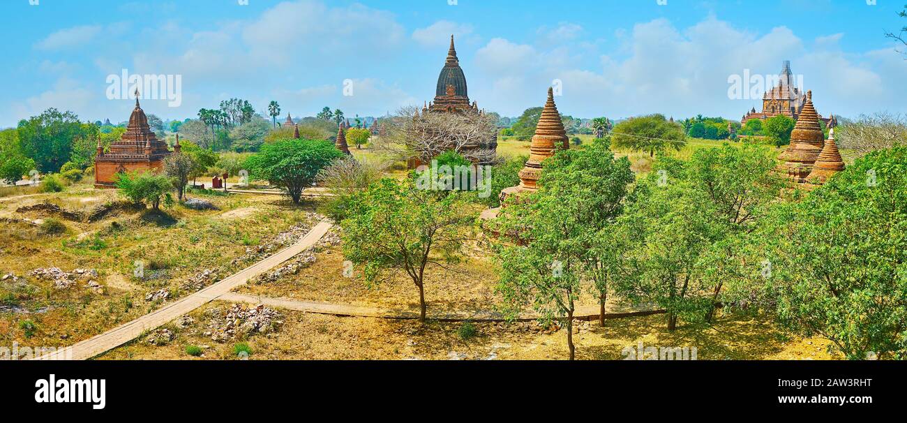 Enjoy top panorama of Bagan, overlooking ancient pagodas and temples, situated on the plain among the green trees, Myanmar Stock Photo