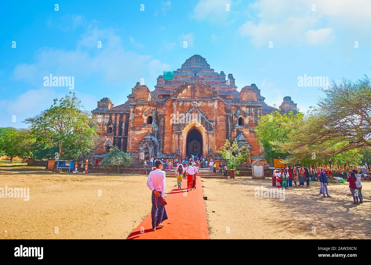 BAGAN, MYANMAR - FEBRUARY 25, 2018:  The red carpet leads to the main entrance of Dhammayangyi Pagoda - the famous Buddhist temple and the largest in Stock Photo