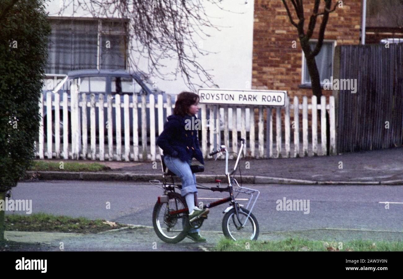 Girl sitting on her American export Raleigh Chopper bike in 1978 in the suburbs of London UK. Stock Photo