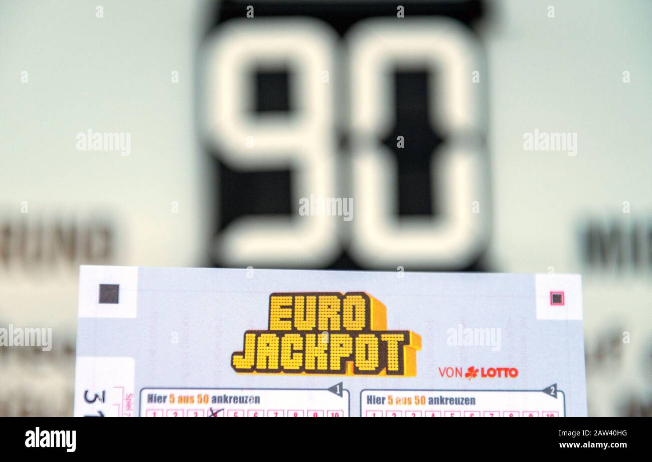 Freiburg, Germany. 06th Feb, 2020. A Eurojackpot ticket is displayed in  front of a lottery ticket office in front of a board indicating that the  winning amount of 90 million in the
