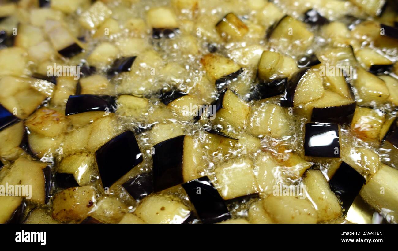 aubergines with a little salt that fry in a casserole Stock Photo Alamy