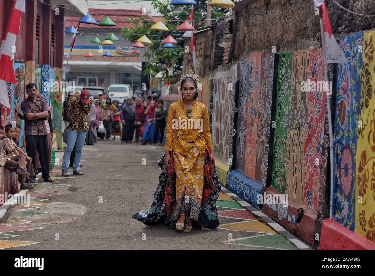 A model walk at runway presents creation Batik Bogor at the Village Batik in the City of Bogor, West Java, on August 24, 2019. Stock Photo