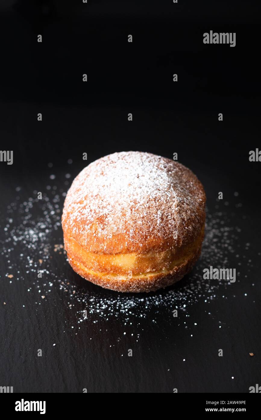 Food concept single French yeast doughnut deepfried choux