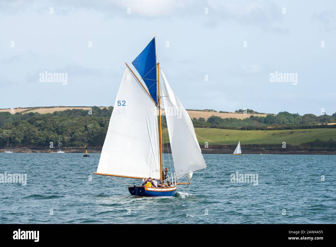 Traditional Falmouth working boats in full sail in the breezes of the