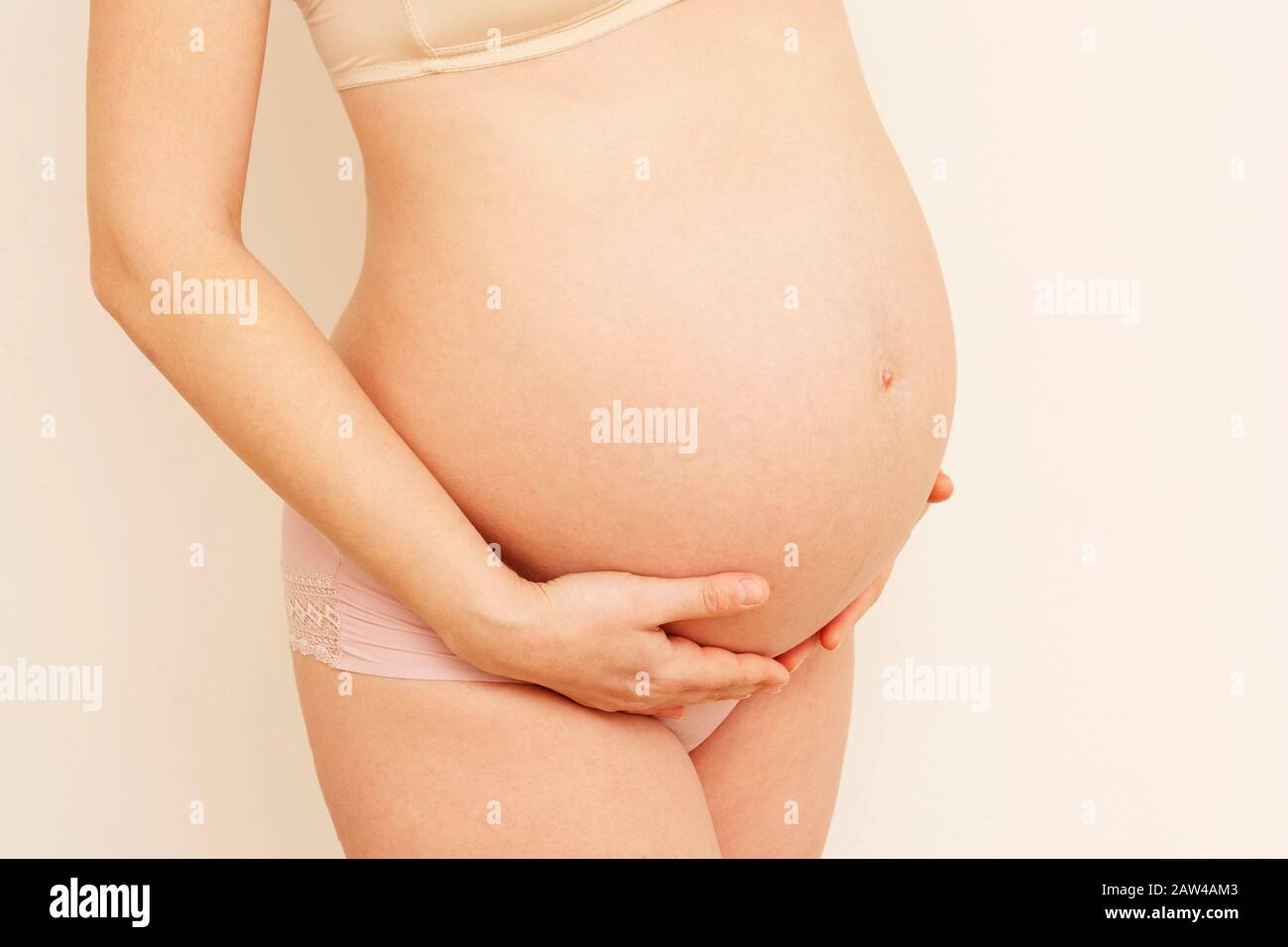 Beautiful pregnant belly close up. Expecting a baby pregnancy and motherhood. Copy space Stock Photo Alamy