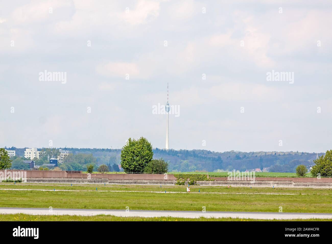 TV Tower Stuttgart - view from Airport Stuttgart, green meadow an runway in front Stock Photo