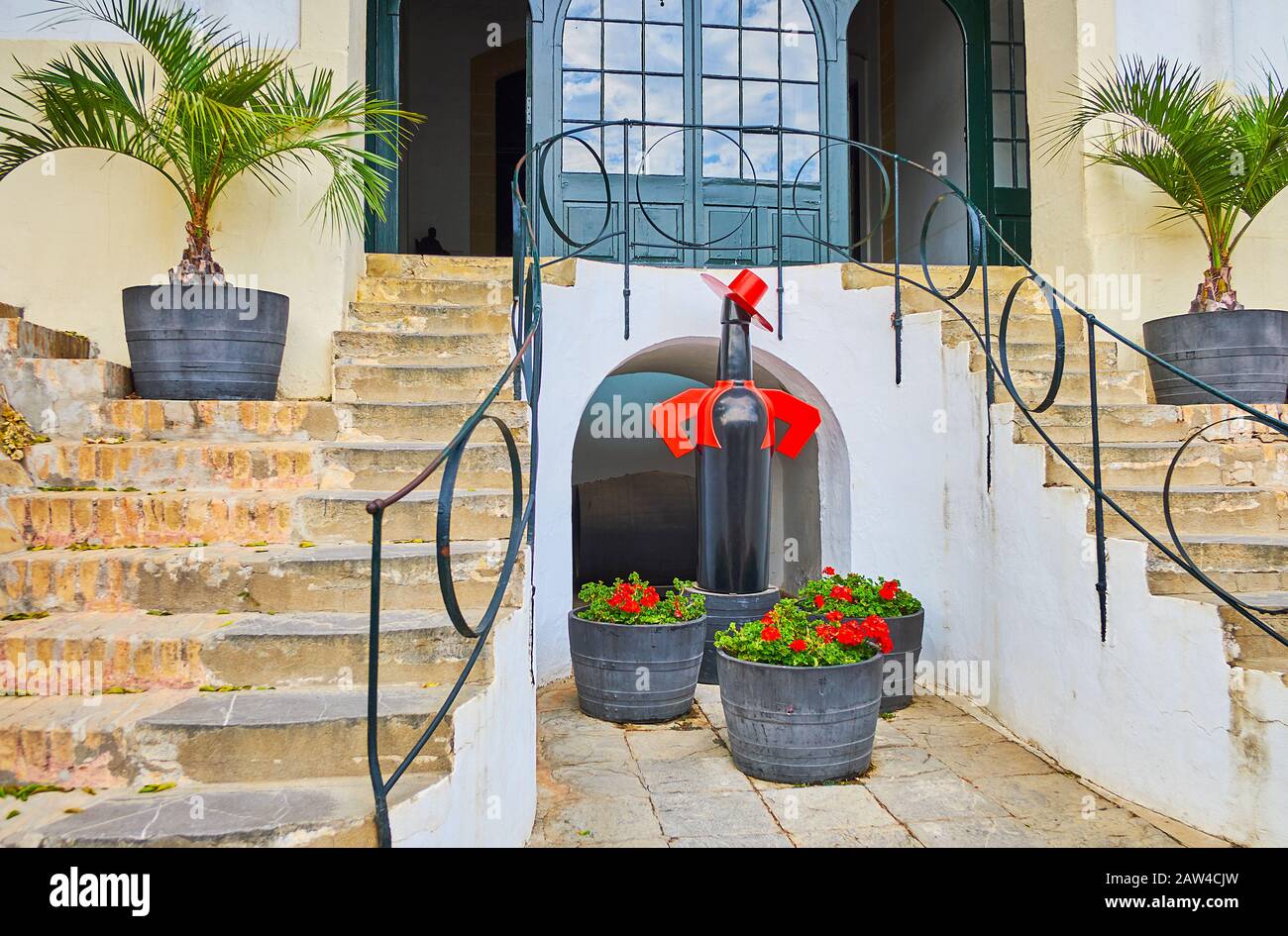 JEREZ, SPAIN - SEPTEMBER 20, 2019: The entrance to Los Apostoles winery of Bodegas Tio Pepe is decorated with installation of company logo - sherry bo Stock Photo