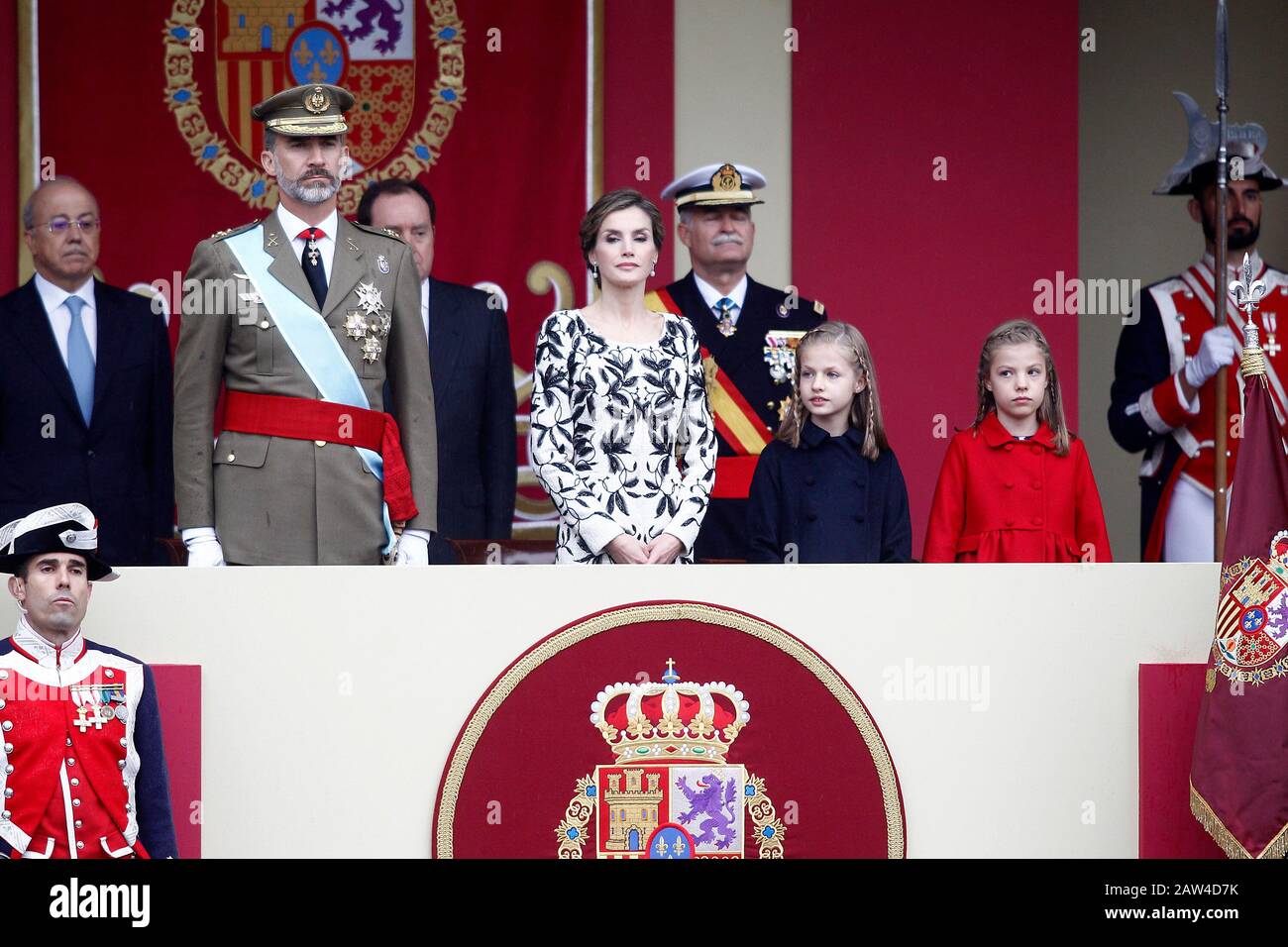 (L-R) King Felipe VI of Spain, Queen Letizia of Spain, Princess Leonor of Spain and Princess Sofia of Spain attend the National Day military parade. O Stock Photo