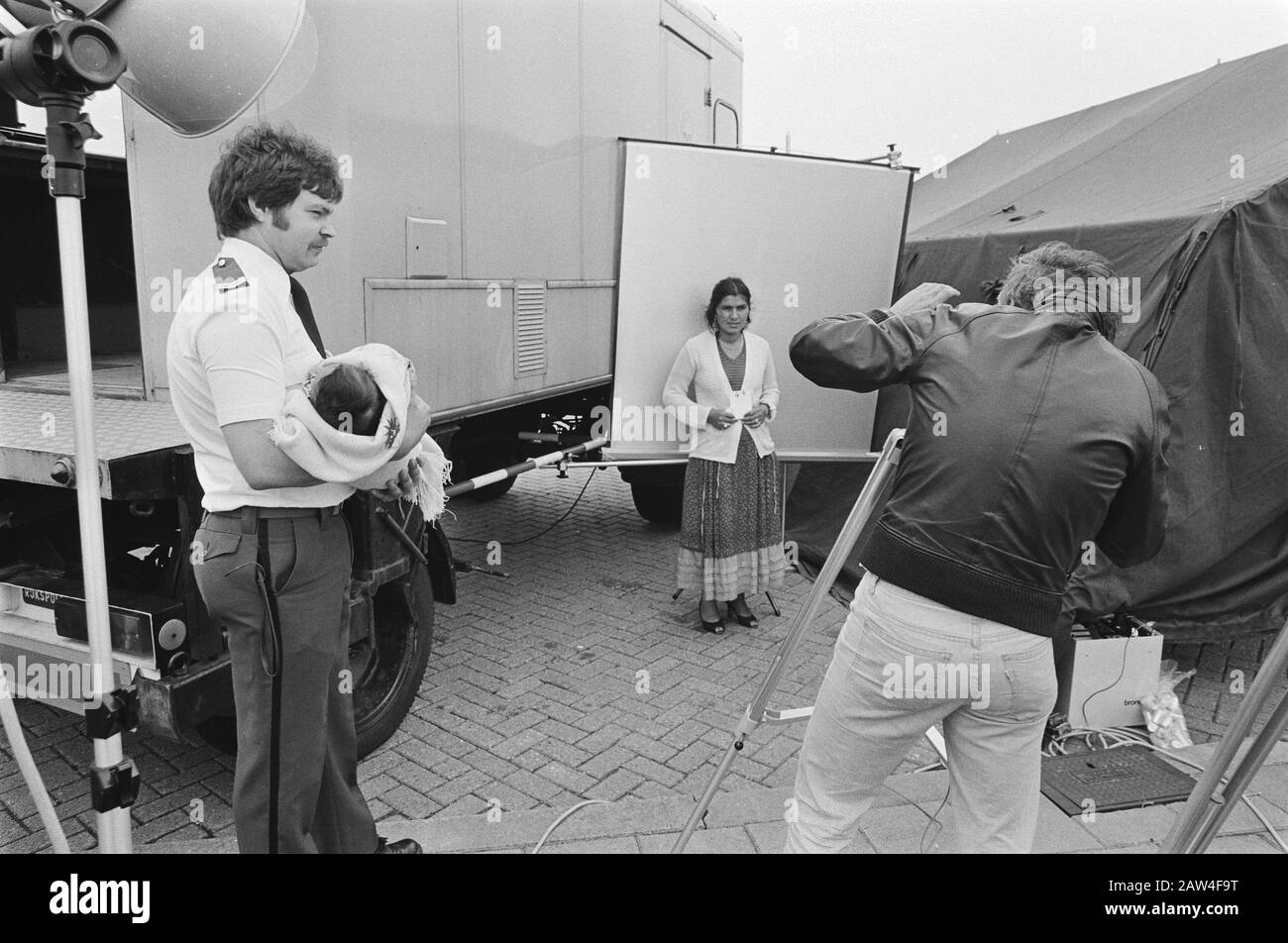 Registration of the group gypsies take some time by Netherlands began by state police in a parking lot in Didam Date: July 14, 1981 Location: Netherlands Keywords: parking, REGISTRATIONS , gendarmerie, gypsies Institution Name: National Police - Stock Image
