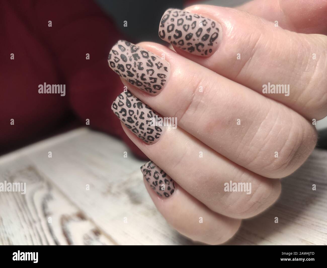 beautiful nail art manicure on the background of a fashionable texture Stock Photo