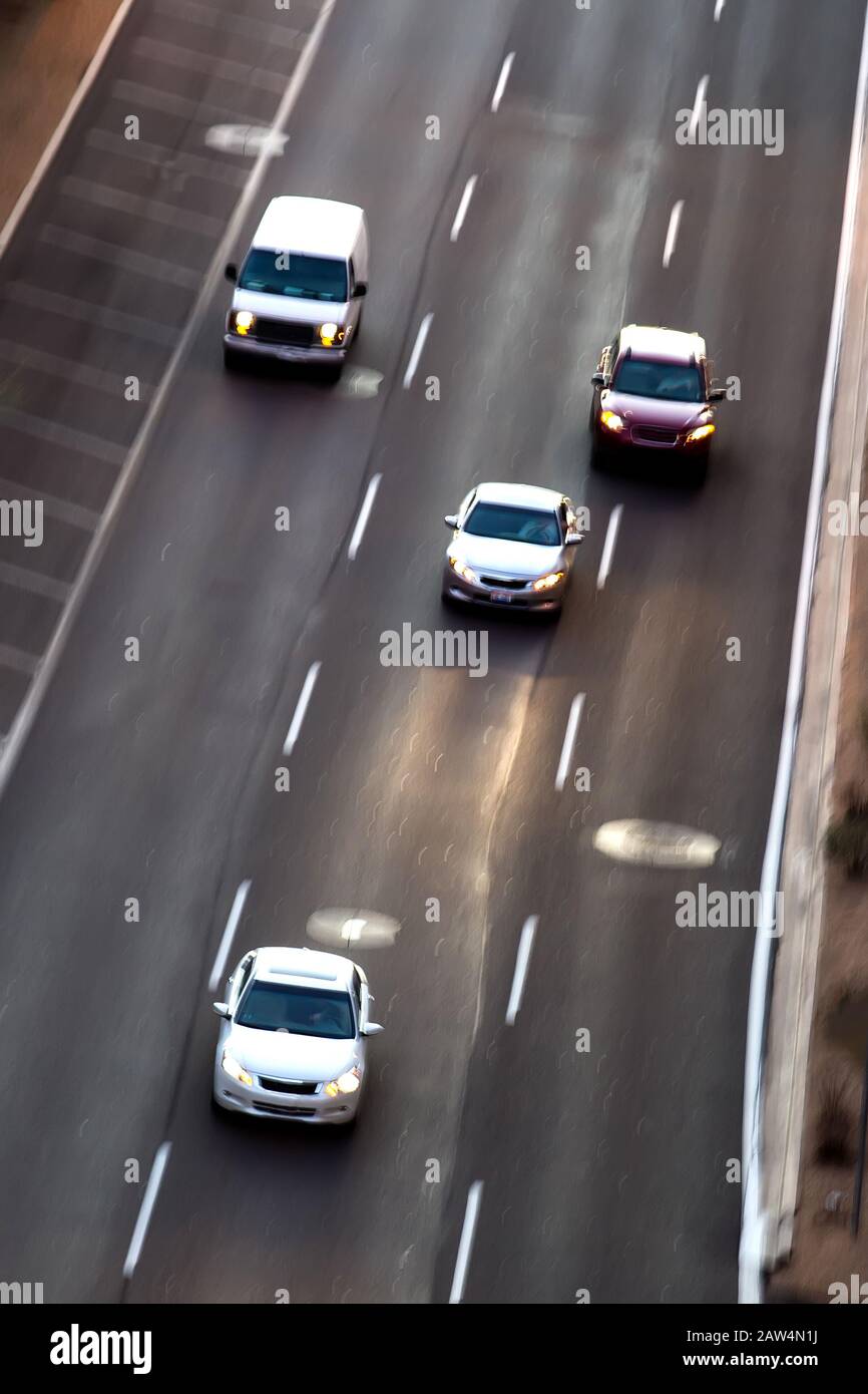 Overhead creative slow motion blur of cars at night on the road. Phoenix, AZ. Stock Photo