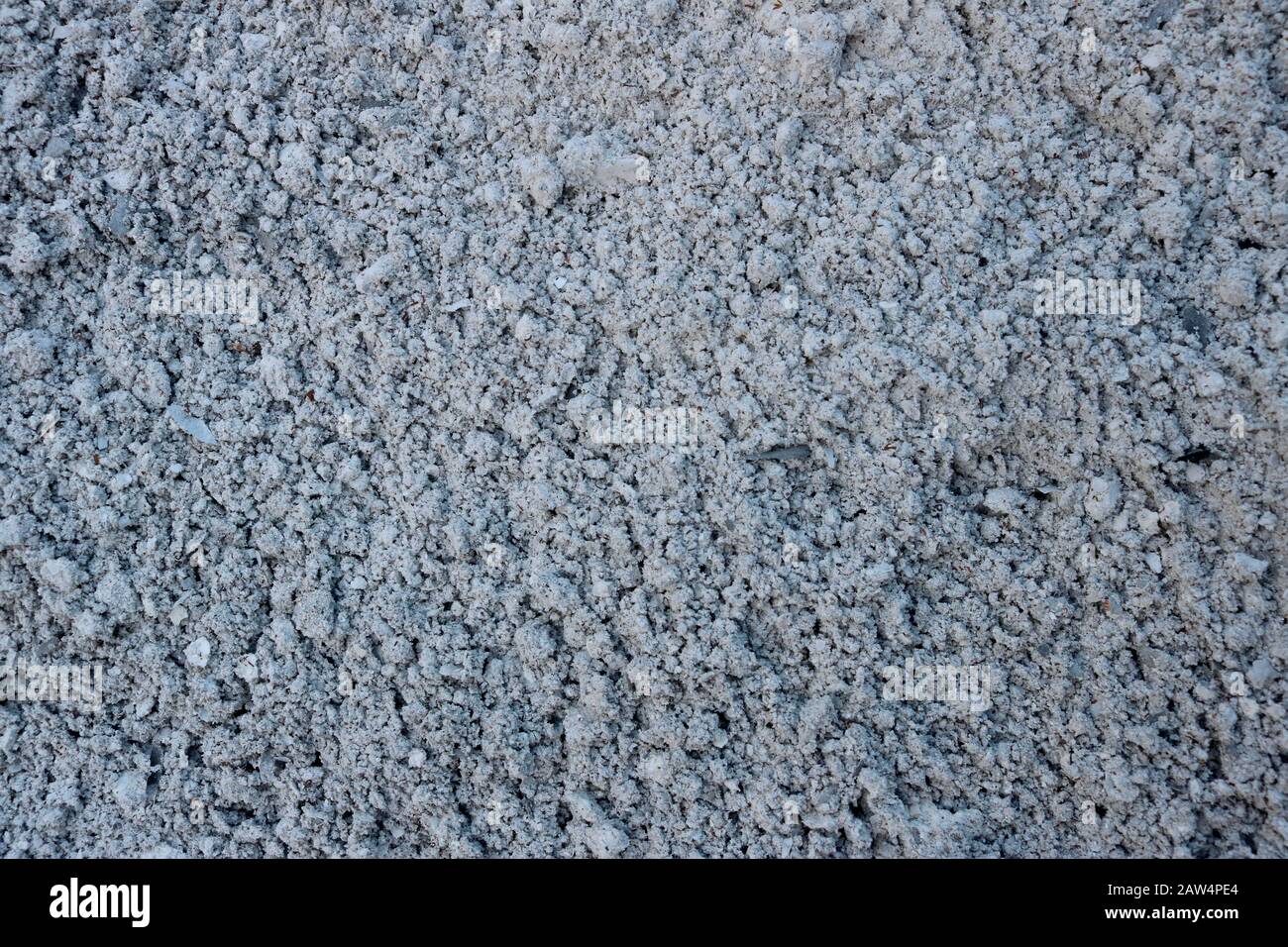 Wet gray ashes as a wallpaper Stock Photo