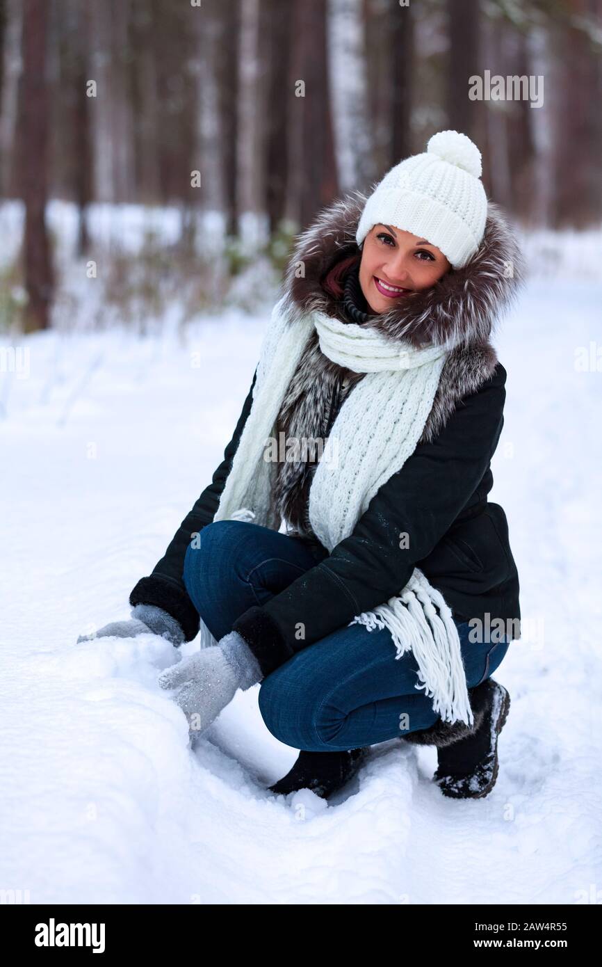 Young girl enjoying snowfall hi-res stock photography and images