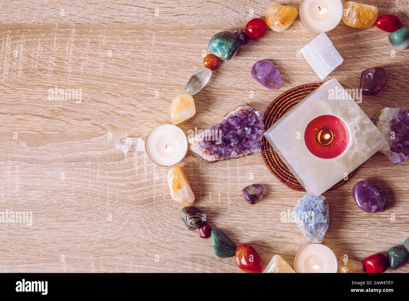 Setting up a semi precious stone crystal grid in home helps your intentions to manifest concept. Alternative lifestyle. Stock Photo