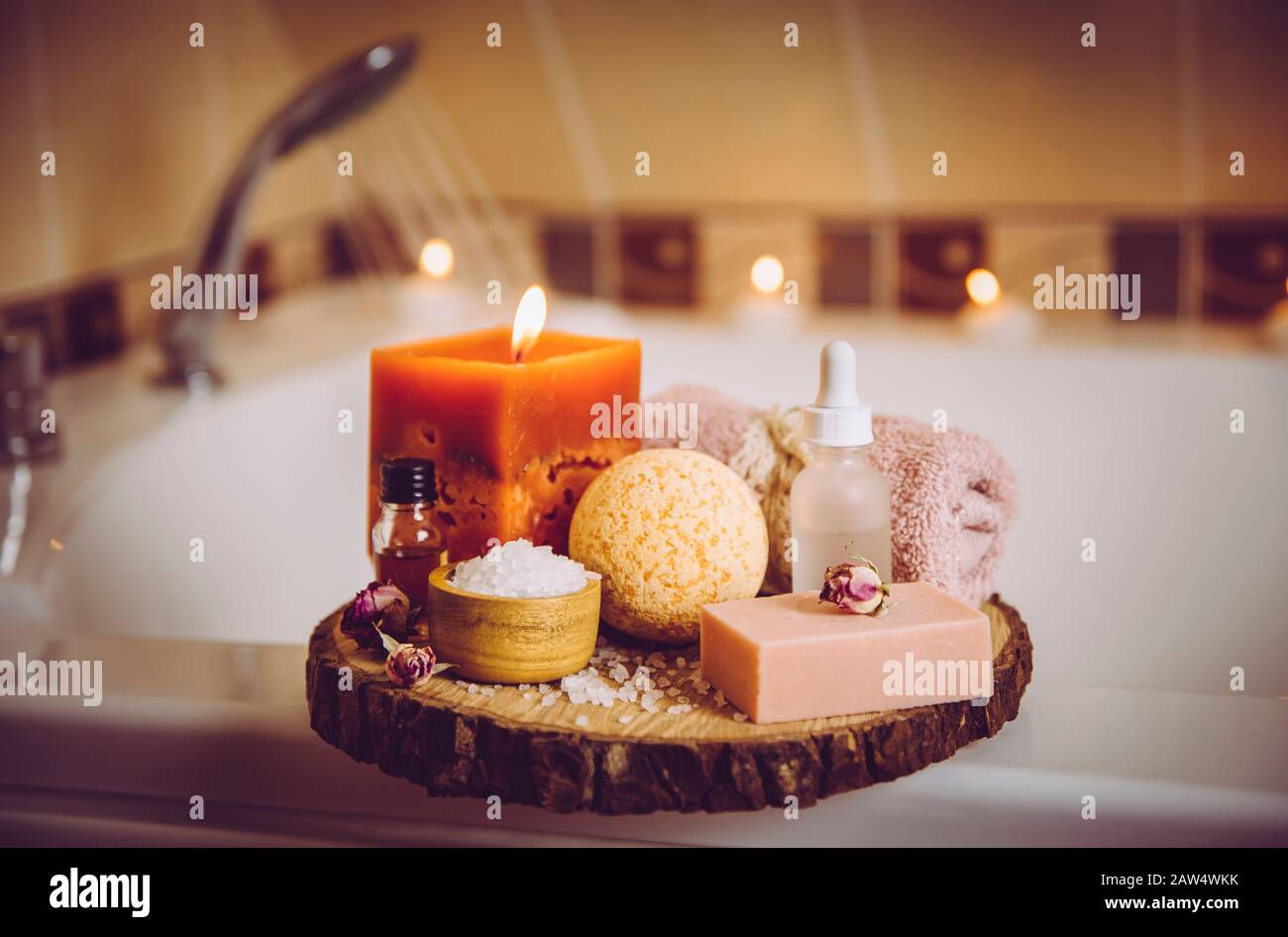 Cozy spa composition of aroma of candles and bath towels, soap. Body care  and hygiene concept Stock Photo - Alamy