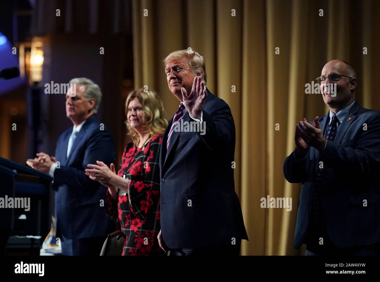 Washington, United States Of America. 06th Feb, 2020. Washington, United States of America. 06 February, 2020. U.S President Donald Trump waves as he arrives at the 2020 National Prayer Breakfast at the Washington Hilton February 6, 2020 in Washington, DC Trump used the normally bipartisan event to savage his opponents calling them vicious and mean following his Senate acquittal in the impeachment trial. Credit: D. Myles Cullen/White House Photo/Alamy Live News Stock Photo