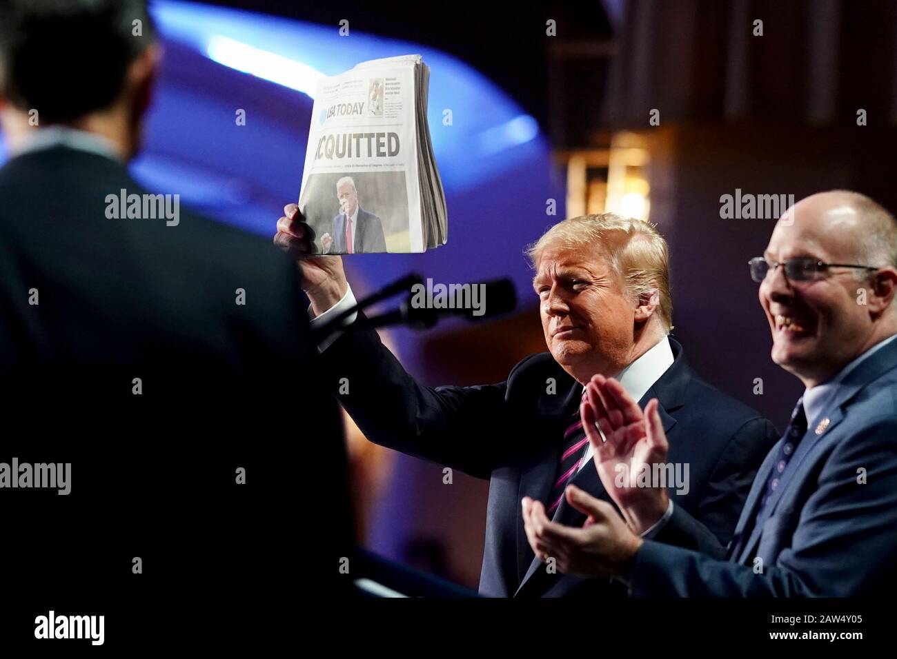 Washington, United States Of America. 06th Feb, 2020. Washington, United States of America. 06 February, 2020. U.S President Donald Trump holds up a copy of the Washington Post during remarks at the 2020 National Prayer Breakfast at the Washington Hilton February 6, 2020 in Washington, DC Trump used the normally bipartisan event to savage his opponents calling them vicious and mean following his Senate acquittal in the impeachment trial. Credit: D. Myles Cullen/White House Photo/Alamy Live News Stock Photo