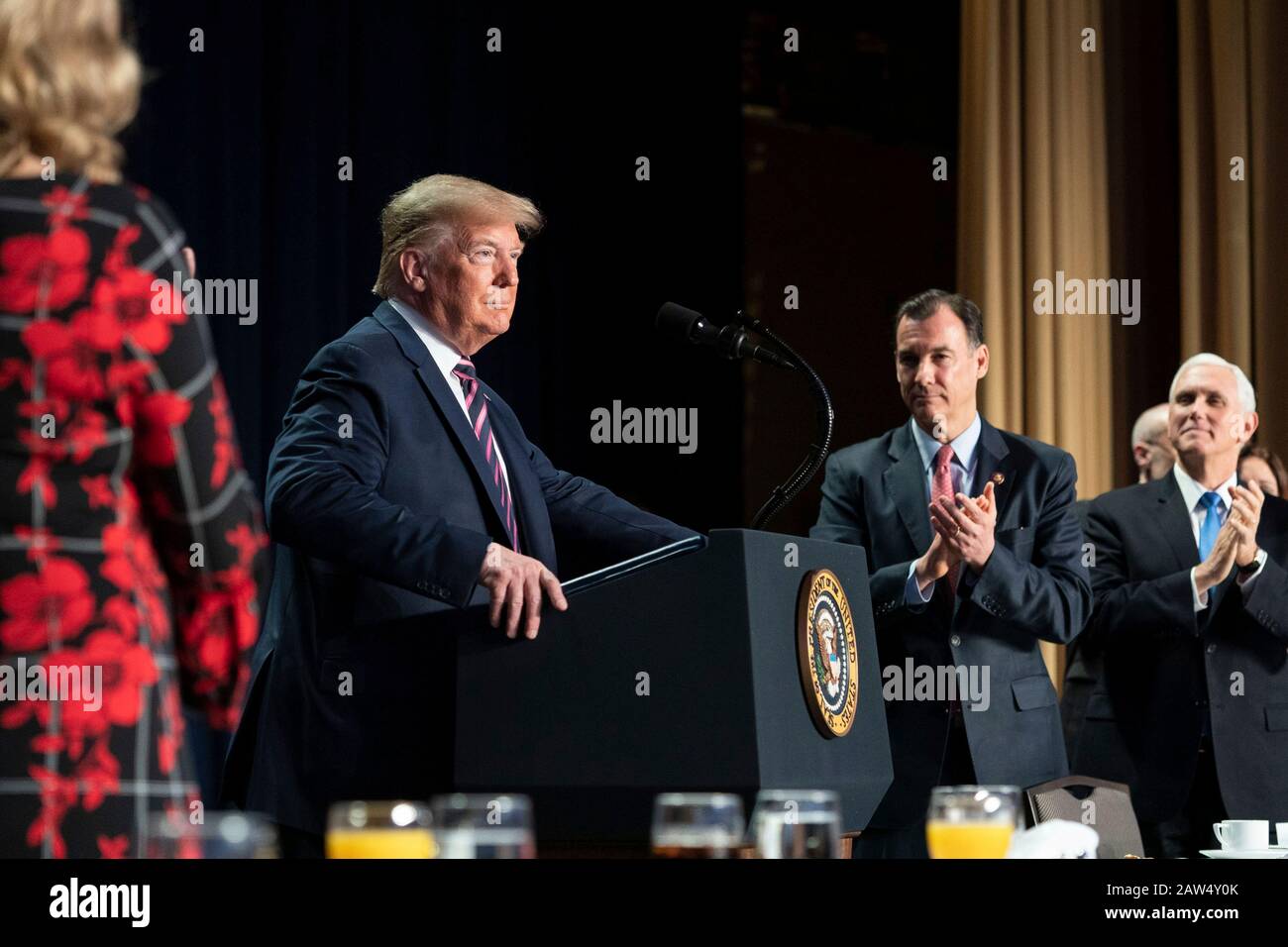 Washington, United States Of America. 06th Feb, 2020. Washington, United States of America. 06 February, 2020. U.S President Donald Trump delivers remarks at the 2020 National Prayer Breakfast at the Washington Hilton February 6, 2020 in Washington, DC Trump used the normally bipartisan event to savage his opponents calling them vicious and mean following his Senate acquittal in the impeachment trial. Credit: Joyce Boghosian/White House Photo/Alamy Live News Stock Photo