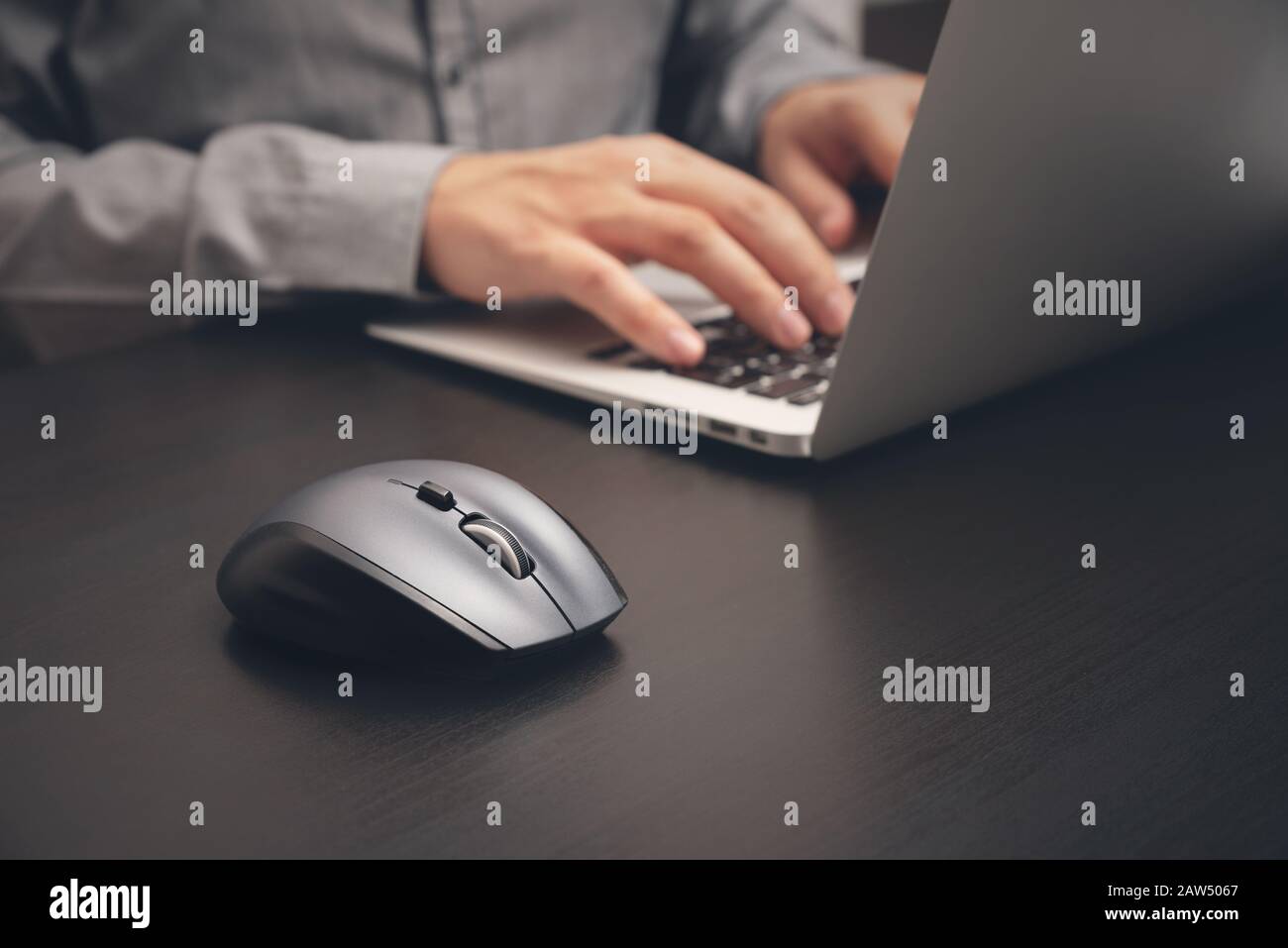 Man working with laptop in office. Business employer at work Stock Photo