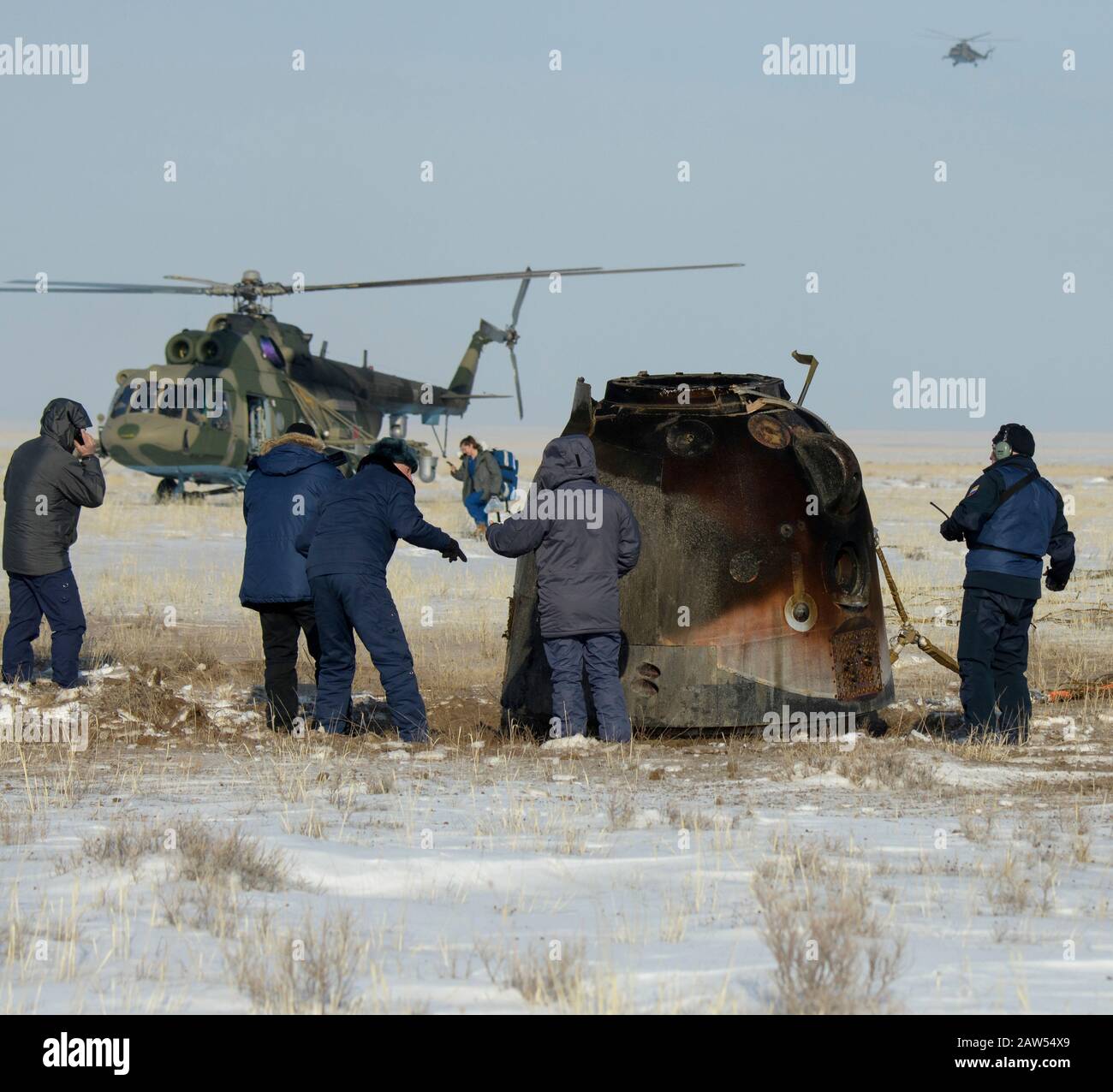 Zhezkazgan, Kazakhstan. 06th Feb, 2020. Russian Search and Rescue teams arrive at the Soyuz MS-13 spacecraft after touchdown with Expedition 61 crew members NASA astronaut Christina Koch, ESA astronaut Luca Parmitano and Roscosmos cosmonaut Alexander Skvortsov February 6, 2020 in a remote area near the town of Zhezkazgan, Kazakhstan. Koch returned to Earth after logging 328 days in space, the longest spaceflight in history by a woman, as a member of Expeditions 59-60-61 on the International Space Station. Credit: Bill Ingalls/NASA/Alamy Live News Stock Photo