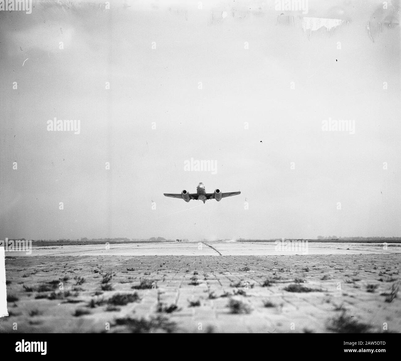 Record Flight Gloster Meteor over Ameland Annotation: Jet takes off from Leeuwarden Air Base Date: August 28, 1949 Location: Leeuwarden Airbase Person Name: Floster Meteor Stock Photo