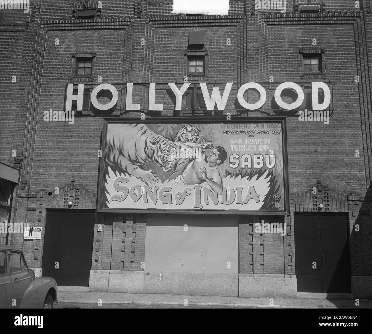 Advertising for the film Song of India on facade cinema Hollywood Annotation: Mission Europa Film Hague Date: April 12, 1950 Location: The Hague, South Holland Keywords: cinemas advertising Institution Name: Roxy Theater Stock Photo