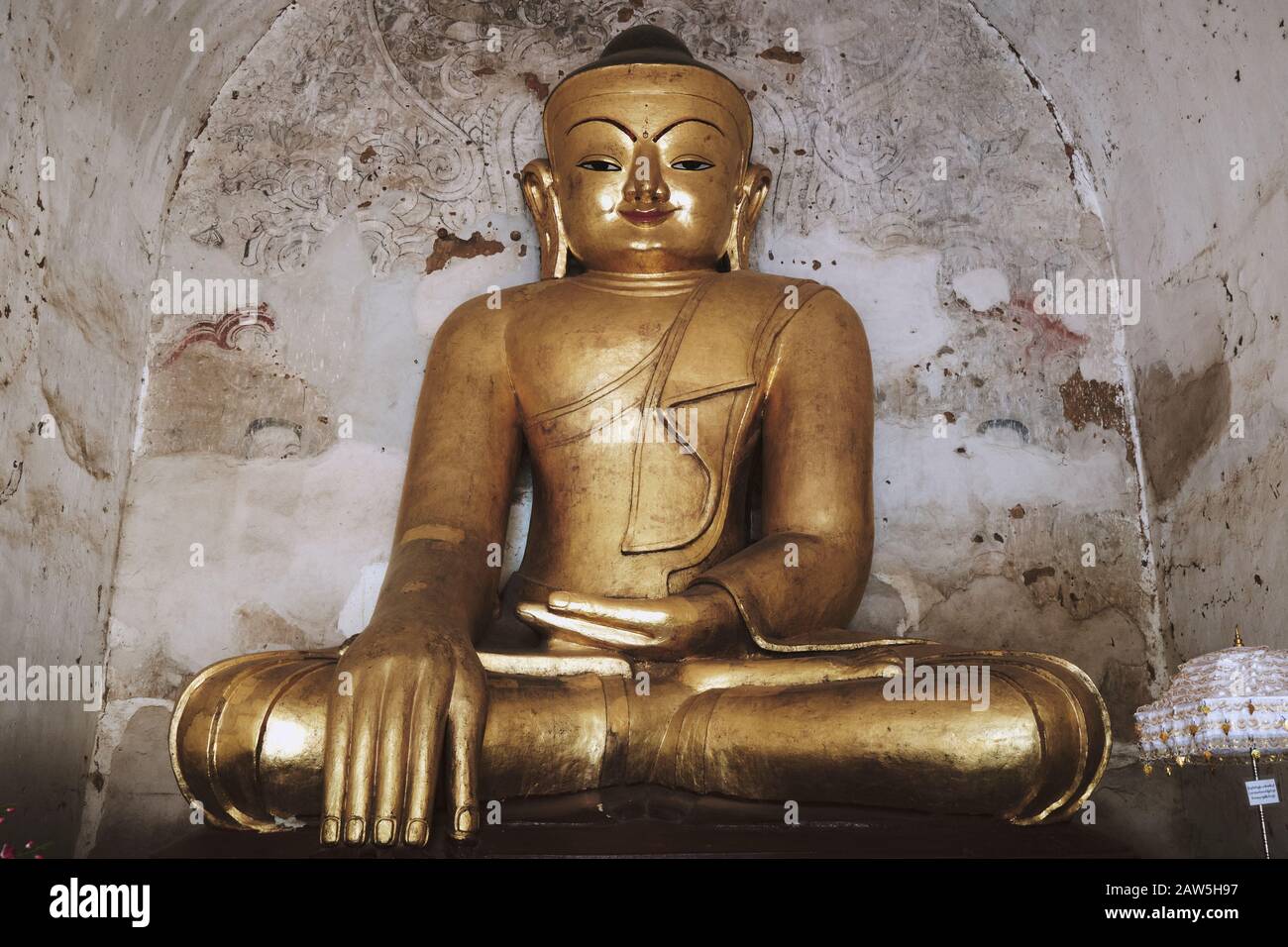 Golden Buddha Statue in Ananda Temple in Bagan Stock Photo - Alamy