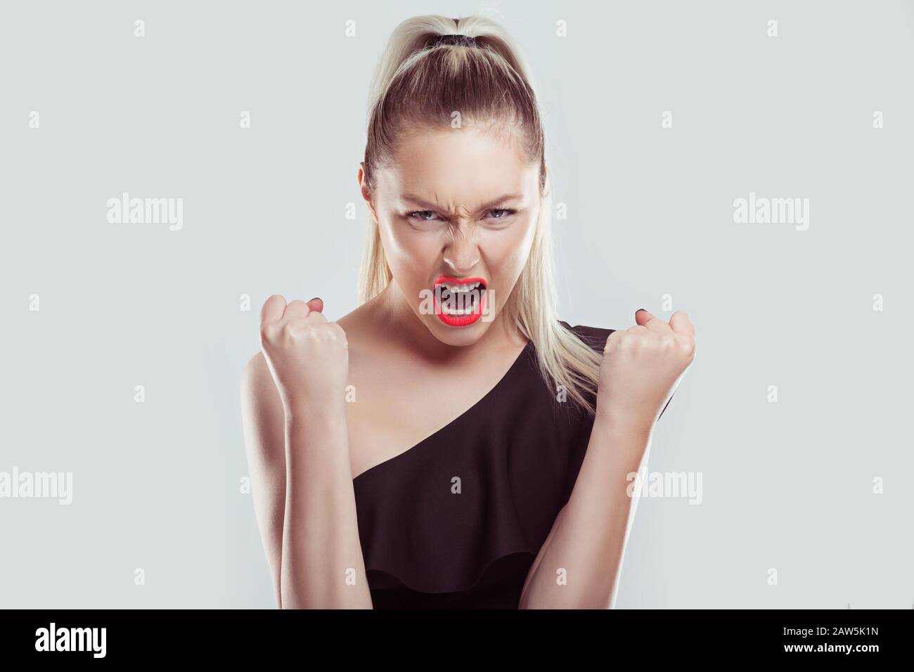 Closeup portrait head shot angry young woman having nervous breakdown ...
