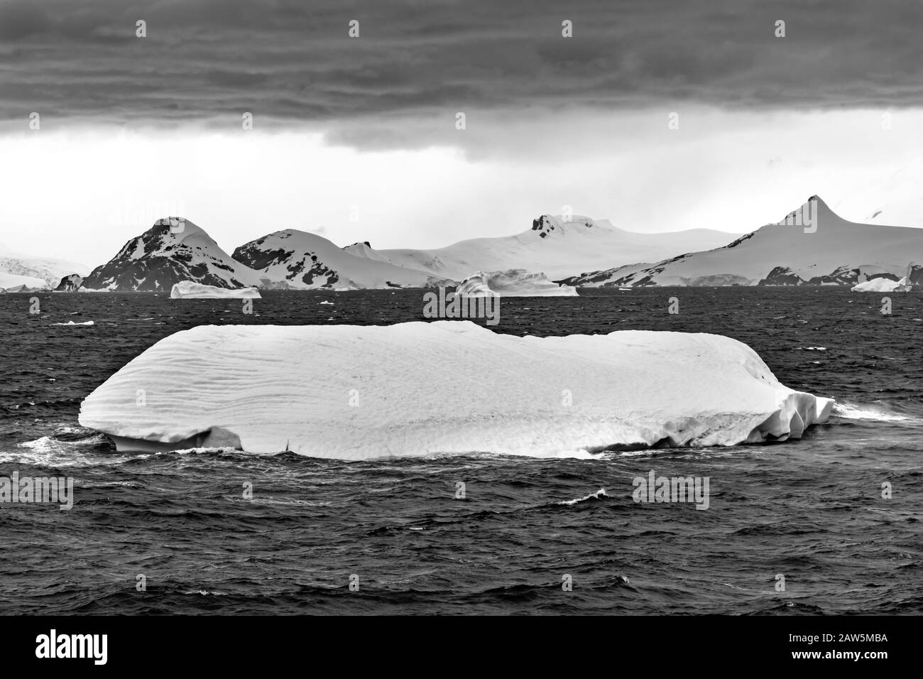 Floating Black White Iceberg Sea Water Glaciers Snow Mountains ...